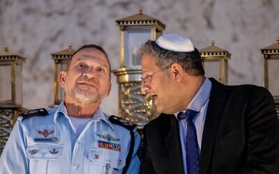 Police chief Kobi Shabtai, left, and Itamar Ben Gvir at a Hanukkah ceremony in Jerusalem on December 19, 2022. (Yonatan Sindel/Flash90)