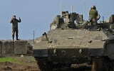 Soldiers from the IDF Combat Engineering Corps prepare for a weeklong joint military exercise with Armored and Givati forces in central Golan Heights, near Moshav Yonatan, on January 10, 2023. (Michael Giladi/Flash90)