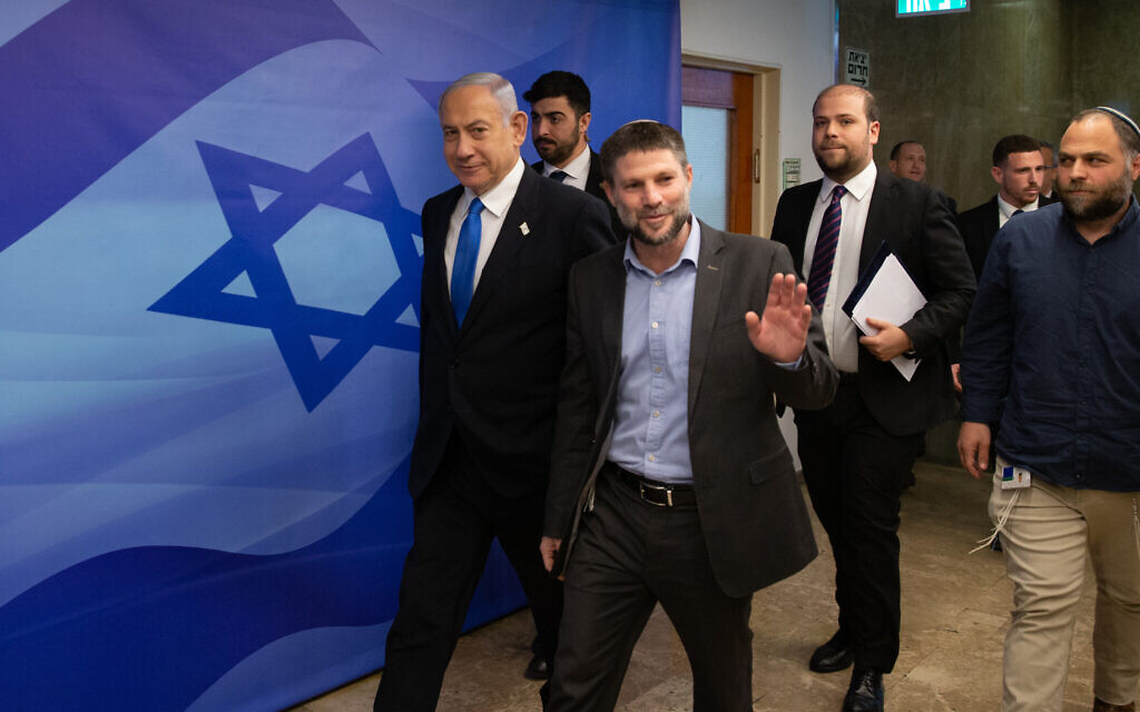 Prime Minister Benjamin Netanyahu (L) and Finance Minister Bezalel Smotrich arrive at a cabinet meeting at the Prime Minister's Office in Jerusalem on February 23, 2023. (Alex Kolomoisky/Pool) Prime Minister Benjamin Netanyahu (L) and Finance Minister Bezalel Smotrich arrive at a cabinet meeting at the Prime Minister's Office in Jerusalem on February 23, 2023. (Alex Kolomoisky/Pool)