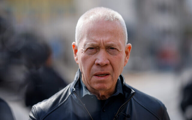 Defense Minister Yoav Galant at the scene of a deadly terror attack a day earlier in Huwara, near Nablus, February 27, 2023. (Erik Marmor/Flash90) Defense Minister Yoav Galant at the scene of a deadly terror attack a day earlier in Huwara, near Nablus, February 27, 2023. (Erik Marmor/Flash90)