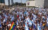 Demonstrators block a road and clash with police as they protest against the government's planned judicial overhaul, in Tel Aviv, March 1, 2023. (Erik Marmor/Flash90)