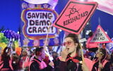 Thousands of Israeli protesters rally against Israeli Goverment's judicial overhaul bills in the coastal city of Tel Aviv on March 18, 2023. (Gili Yaari /Flash90)