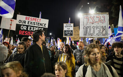 Israelis protest against the government's planned judicial overhaul, near the Prime Minister's official residence in Jerusalem, March 23, 2023. (Noam Revkin Fenton/Flash90)
