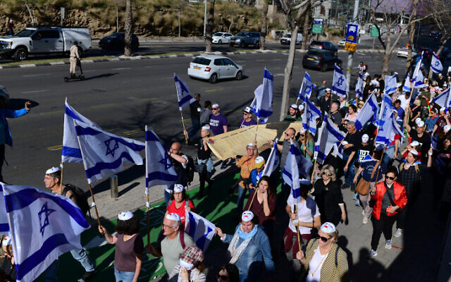 Israelis protest against the government's planned judicial overhaul, in Tel Aviv on March 28, 2023. (Tomer Neuberg/ Flash90) Israelis protest against the government's planned judicial overhaul, in Tel Aviv on March 28, 2023. (Tomer Neuberg/ Flash90)