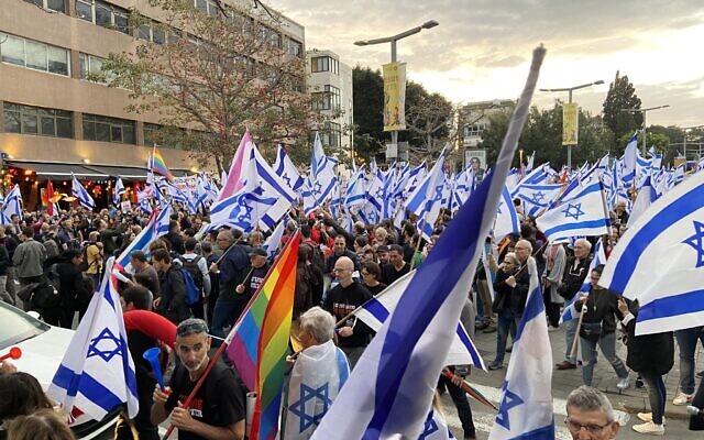 Protesters gather at Tel Aviv Habima Square ahead of a march toward Kaplan Street, for a rally against the judicial overhaul, March 25, 2023. (DH/Times of Israel) Protesters gather at Tel Aviv Habima Square ahead of a march toward Kaplan Street, for a rally against the judicial overhaul, March 25, 2023. (DH/Times of Israel)