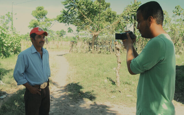 A still of Oren Levy filming his biological father Mario in Guatemala, in 'I am Not.' (Courtesy/ Itai Raziel)