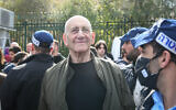 Former prime minister Ehud Olmert at a protest against the judicial overhaul, outside the Knesset in Jerusalem. February 13, 2023. (Arie Leib Abrams/FLASH90)