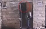 Screen capture from video of Mahmoud Tawil during an incident when he allegedly raped a woman at a Jerusalem public restroom. (Channel 13. Used in accordance with Clause 27a of the Copyright Law)