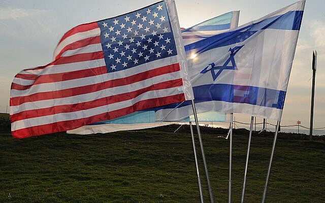 U.S. and Israeli flags are flown in preparation for a media event during Austere Challenge 2012 in Israel Oct. 24, 2012. Austere Challenge 2012 is a three-week bilateral exercise designed to increase air defense interoperability between the United States and Israel. (U.S. Air Force photo by Maj. Stephanie Addison/Released) U.S. and Israeli flags are flown in preparation for a media event during Austere Challenge 2012 in Israel Oct. 24, 2012. Austere Challenge 2012 is a three-week bilateral exercise designed to increase air defense interoperability between the United States and Israel. (U.S. Air Force photo by Maj. Stephanie Addison/Released)