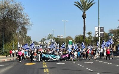Parents and children block Tel Aviv's Namir thoroughfare during protests against the judicial overhaul, March 1, 2023 (Times of Israel)