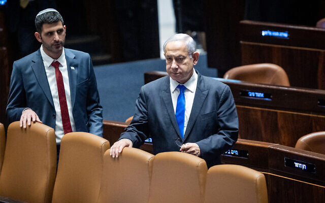 Prime Minister Benjamin Netanyahu, right, and Communications Minister Shlomo Karhi, left, at the Knesset in Jerusalem, March 1, 2023. (Yonatan Sindel/Flash90) Prime Minister Benjamin Netanyahu, right, and Communications Minister Shlomo Karhi, left, at the Knesset in Jerusalem, March 1, 2023. (Yonatan Sindel/Flash90)