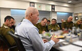 File: Defense Minister Yoav Gallant holds a security meeting with defense officials, January 28, 2023. (Ariel Hermoni/Defense Ministry)