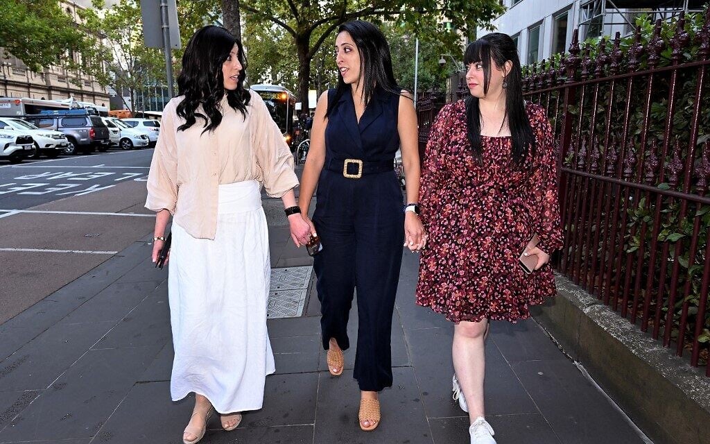 Sisters Nicole Meyer (L), Elly Sapper (C) and Dassi Erlich (R) leave the County Court in Melbourne on April 3, 2023, after the trial of former school principal Malka Leifer. (William WEST / AFP) Sisters Nicole Meyer (L), Elly Sapper (C) and Dassi Erlich (R) leave the County Court in Melbourne on April 3, 2023, after the trial of former school principal Malka Leifer. (William WEST / AFP)
