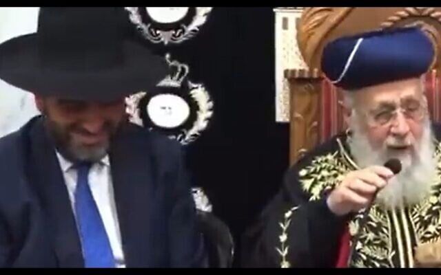 Health and Interior Minister Moshe Arbel (left) smiles as Sephardic Chief Rabbi Yitzhak Yosef tells him he should transfer funds to municipalities on the condition they build synagogues and yeshivas, April 22, 2023. (Twitter video screenshot; used in accordance with Clause 27a of the Copyright Law) Health and Interior Minister Moshe Arbel (left) smiles as Sephardic Chief Rabbi Yitzhak Yosef tells him he should transfer funds to municipalities on the condition they build synagogues and yeshivas, April 22, 2023. (Twitter video screenshot; used in accordance with Clause 27a of the Copyright Law)