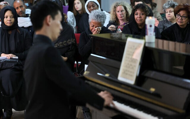 A man plays a piano belonging to late Ethiopian nun and pianist Emahoy Tsegue-Maryam Guebrou, during her funeral on March 31, 2023, at the Kidane Mehret Ethiopian Orthodox Church in Jerusalem. (AHMAD GHARABLI / AFP) A man plays a piano belonging to late Ethiopian nun and pianist Emahoy Tsegue-Maryam Guebrou, during her funeral on March 31, 2023, at the Kidane Mehret Ethiopian Orthodox Church in Jerusalem. (AHMAD GHARABLI / AFP)