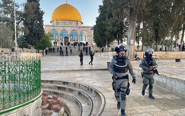 Police walk inside the Al-Aqsa mosque compound in Jerusalem, early on April 5, 2023 after clashes erupted during Islam's holy month of Ramadan. (Ahmad Gharabli/AFP) Police walk inside the Al-Aqsa mosque compound in Jerusalem, early on April 5, 2023 after clashes erupted during Islam's holy month of Ramadan. (Ahmad Gharabli/AFP)