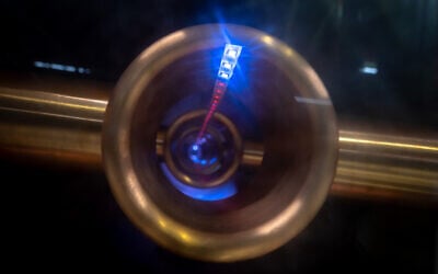 A radio frequency particle accelerator is displayed in an exhibition during a press tour at the European Organization for Nuclear Research (CERN) on the Future Circular Collider (FCC) feasibility study, in Geneva, on April 19, 2023. (Fabrice Coffrini/AFP)