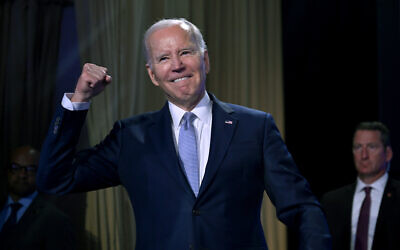 US President Joe Biden gestures on stage at the Washington Hilton on April 25, 2023. (Jim Watson/AFP)