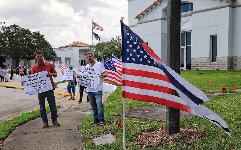 Counter-protesters at a planned neo-Nazi demonstration in Ormond Beach, Florida, thank Volusia County Sheriff Michael Chitwood 'for standing against antisemitism,' April 22, 2023. Chitwood has had white supremacists who have threatened him online arrested and extradited to his county. (Nadia Zomorodian, courtesy of Volusia County Sheriff via JTA) Counter-protesters at a planned neo-Nazi demonstration in Ormond Beach, Florida, thank Volusia County Sheriff Michael Chitwood 'for standing against antisemitism,' April 22, 2023. Chitwood has had white supremacists who have threatened him online arrested and extradited to his county. (Nadia Zomorodian, courtesy of Volusia County Sheriff via JTA)