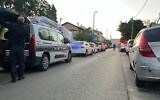 Police at the scene of a shooting in the central city of Lod, April 14, 2023. (Israel Police)