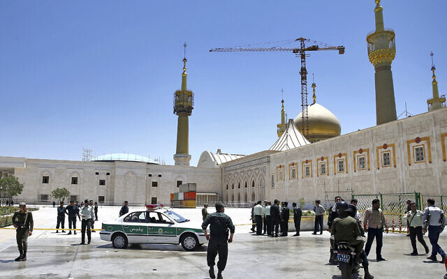 Police officers control the scene, around of shrine of late Iranian revolutionary founder Ayatollah Khomeini, after an assault by several attackers just outside Tehran, Iran, June 7, 2017. (Ebrahim Noroozi/AP) Police officers control the scene, around of shrine of late Iranian revolutionary founder Ayatollah Khomeini, after an assault by several attackers just outside Tehran, Iran, June 7, 2017. (Ebrahim Noroozi/AP)