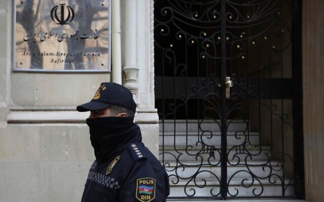 A police officer guards an area in front of the Iranian Embassy in Baku, Azerbaijan, Friday, Jan. 27, 2023. According to Azerbaijan's Foreign Ministry a man armed with a Kalashnikov-style rifle attacked the Azerbaijan Embassy in Iran's capital Tehran, killing the head of security at the diplomatic post and wounding two guards. (AP Photo/Aziz Karimov)