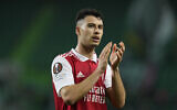 Arsenal's Gabriel Martinelli waves fans at the end of the Europa League round of 16, first leg, soccer match between Sporting CP and Arsenal at the Alvalade stadium in Lisbon, Thursday, March 9, 2023. (AP Photo/Armando Franca)
