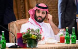 Crown Prince Mohammed bin Salman of Saudi Arabia takes his seat ahead of a working lunch at the G20 Summit, November 15, 2022, in Nusa Dua, Bali, Indonesia. (Leon Neal/Pool Photo via AP, File)