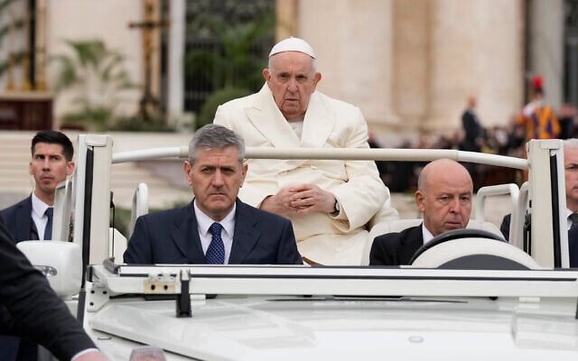 Pope Francis arrives to celebrate the Palm Sunday's mass in St. Peter's Square at The Vatican, April 2, 2023. (AP Photo/Andrew Medichini)