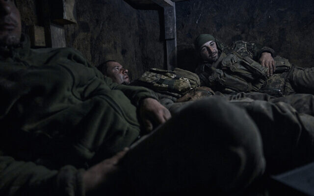 Illustrative: Ukrainian soldiers rest in a dugout on the frontline in Bakhmut, Donetsk region, Ukraine, Monday, April 10, 2023. (AP Photo/Libkos) Illustrative: Ukrainian soldiers rest in a dugout on the frontline in Bakhmut, Donetsk region, Ukraine, Monday, April 10, 2023. (AP Photo/Libkos)