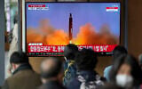 A TV screen is seen reporting North Korea's missile launch with file footage during a news program at the Seoul Railway Station in Seoul, South Korea, April 13, 2023. (Lee Jin-man/AP)