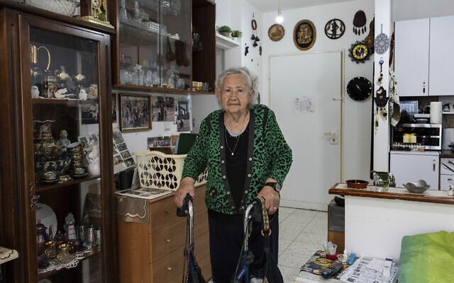 Holocaust survivor Tova Gutstein, 90, who lived in the Warsaw Ghetto as a child, poses for a photo at her apartment in the central city of Rishon Lezion, April 9, 2023. (AP Photo/Tsafrir Abayov) Holocaust survivor Tova Gutstein, 90, who lived in the Warsaw Ghetto as a child, poses for a photo at her apartment in the central city of Rishon Lezion, April 9, 2023. (AP Photo/Tsafrir Abayov)