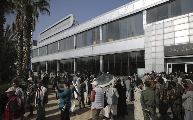 A crowd gathers at the airport ahead of a prisoner exchange in Sanaa, Yemen, April 14, 2023. (AP/Hani Mohammed) A crowd gathers at the airport ahead of a prisoner exchange in Sanaa, Yemen, April 14, 2023. (AP/Hani Mohammed)