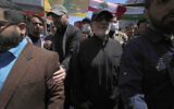 Head of Iran's Quds Force, Gen. Esmail Qaani, second right, attends a rally to mark Jerusalem Day, an annual show of support for the Palestinians, in Tehran, Iran, Friday, April 14, 2023. (AP Photo/Vahid Salemi)