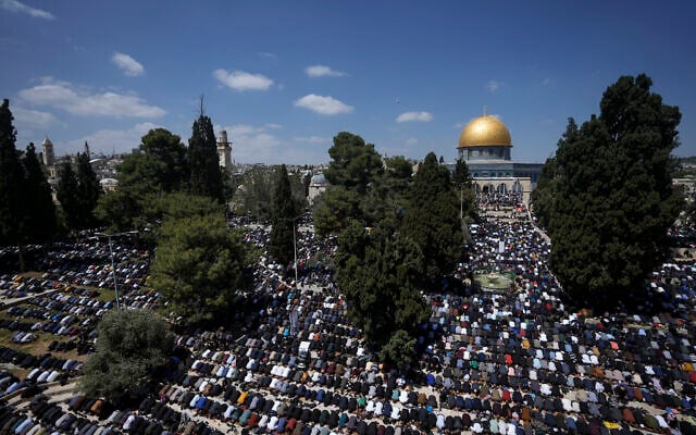 Muslim worshipers perform Friday prayers at the Al-Aqsa Mosque compound in the Old City of Jerusalem, during the Muslim holy month of Ramadan, Friday, April 14, 2023. (AP Photo/Mahmoud Illean)
