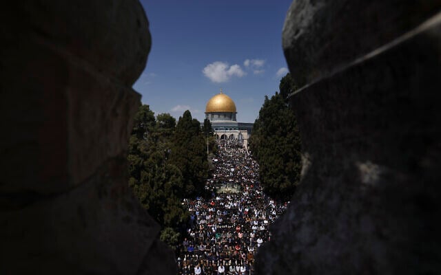 Muslim worshippers perform Friday prayers at the Al-Aqsa Mosque compound in the Old City of Jerusalem, during the Muslim holy month of Ramadan, Friday, April 14, 2023. (AP Photo/Mahmoud Illean)