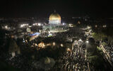Palestinian Muslim worshipers pray during Laylat Al Qadr, also known as the Night of Destiny, in front of the Dome of the Rock, in the Temple Mount compound in Jerusalem's Old City, April 17, 2023. (Mahmoud Illean/AP)