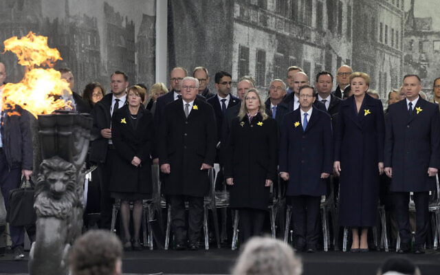 Front from right, Polish President Andrzej Duda, Agata Kornhauser-Duda, Israel's President Isaac Herzog, Michal Herzog, German President Frank-Walter Steinmeier and Elke Buedenbender attend a Warsaw Ghetto Uprising commemoration event in Warsaw, Poland, April 19, 2023. (AP Photo/Czarek Sokolowski)