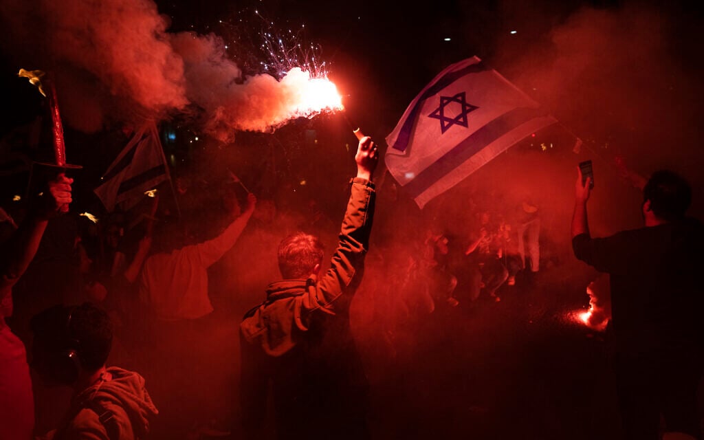 Israelis protest against plans by Prime Minister Benjamin Netanyahu's government to overhaul the judicial system, in Tel Aviv, March 9, 2023. (Oded Balilty/AP) Israelis protest against plans by Prime Minister Benjamin Netanyahu's government to overhaul the judicial system, in Tel Aviv, March 9, 2023. (Oded Balilty/AP)