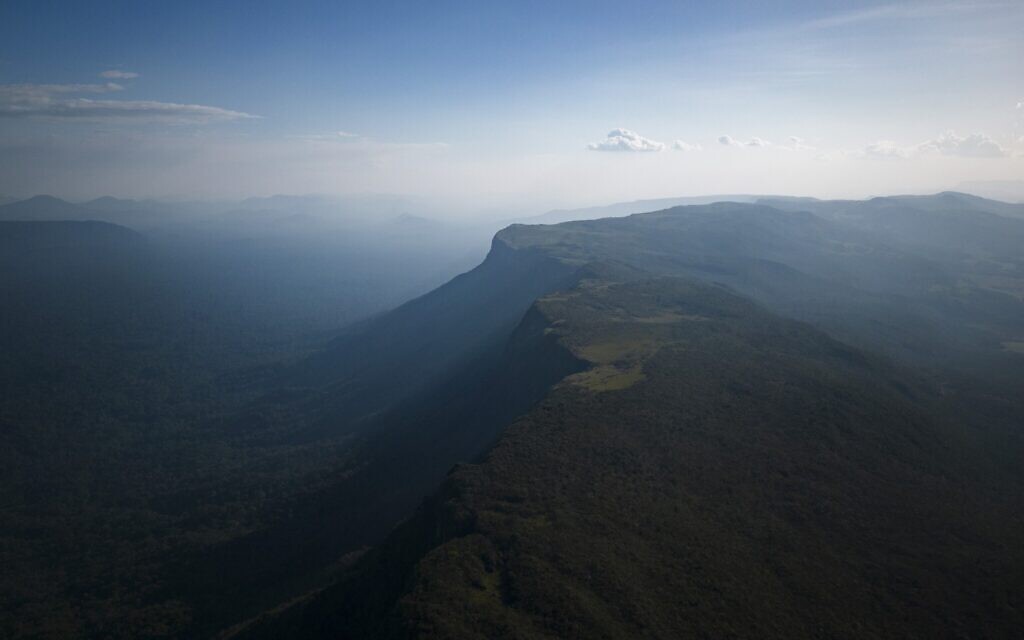 Clouds hover over the Woipan Tepuy on Pemon Indigenous territory at the Gran Sabana, Bolivar state, Venezuela, Wednesday, April 5, 2023. (AP/Matias Delacroix)