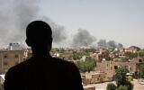 Smoke is seen in Khartoum, Sudan, April 22, 2023, where fighting between the Sudanese Army and Rapid Support Forces resumed after an internationally brokered ceasefire failed. (AP Photo/Marwan Ali)