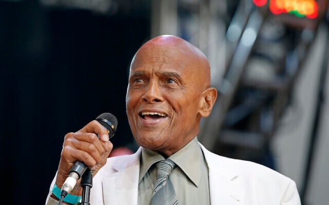 FILE - Singer and activist Harry Belafonte speaks during a memorial tribute concert for folk icon and civil rights activist Pete Seeger in New York on July 20, 2014. (AP Photo/Kathy Willens, file)