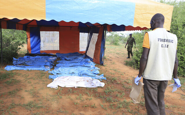 Body bags with victims of a Christian cult are seen during the exhumation from a forest at Shakahola outskirts of Malindi town, Kenyan Coast, April 25, 2023. (AP Photo) Body bags with victims of a Christian cult are seen during the exhumation from a forest at Shakahola outskirts of Malindi town, Kenyan Coast, April 25, 2023. (AP Photo)
