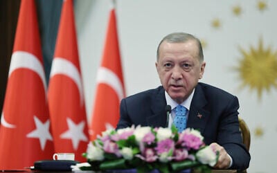 In this handout photo released by Turkish Presidency, Turkey's President Recep Tayyip Erdogan inaugurates Turkey's first nuclear power plant via a video link, at the Presidential palace in Ankara, Thursday, April 27, 2023. (Turkish Presidency via AP)