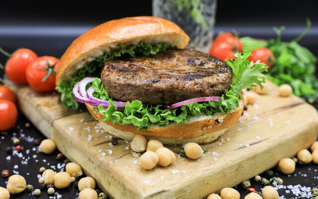 Israeli food tech startup Meat. The End introduces world's first texturized chickpea protein burger. (Ruthie Amano/Courtesy) Israeli food tech startup Meat. The End introduces world's first texturized chickpea protein burger. (Ruthie Amano/Courtesy)