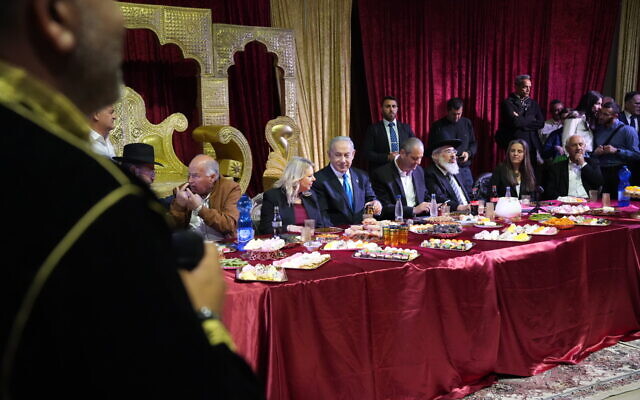Prime Minister Benjamin Netanyahu and his wife, Sara Netanyahu, attend a Mimouna celebration in the coastal city of Hadera, April 12, 2023 (Kobi Alkotzer, GPO) Prime Minister Benjamin Netanyahu and his wife, Sara Netanyahu, attend a Mimouna celebration in the coastal city of Hadera, April 12, 2023 (Kobi Alkotzer, GPO)