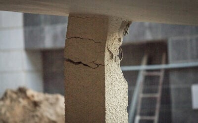 A view of a collapsed columnas part of a TAMA 38 renewal project in Kiryat Bialik, on October 24, 2018. (Meir Vaaknin/Flash90)