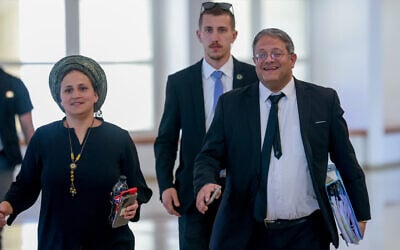 National Security Minister Itamar Ben Gvir, right, arrives with his wife Ayala for a hearing at the Supreme Court in Jerusalem on April 3, 2023. (Erik Marmor/Flash90)