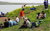 Israelis hike in the Golan Heights during the Passover holiday, April 9, 2023. (Michael Giladi/ Flash90)