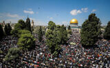 File - Tens of thousands of Muslim worshipers attend the last Friday prayers of the holy month of Ramadan, at the Al-Aqsa Mosque Compound atop the Temple Mount in Jerusalem's Old City, April 14, 2023. (Jamal Awad/Flash90)